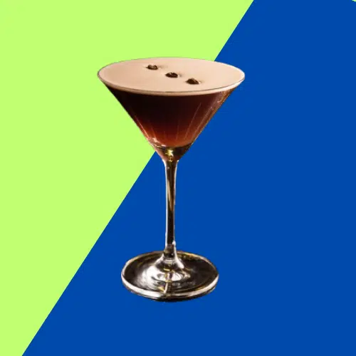 Espresso Martini in a martini glass with coffee beans on the foam