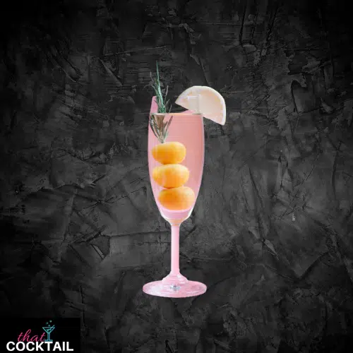 French 75 in a champagne flute with a lemon wheel