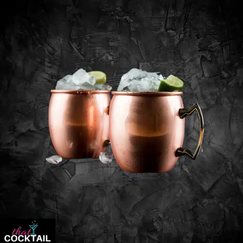 Spicy Mule in two copper mugs with ice and lime