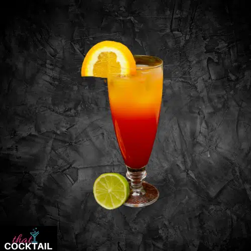 Malibu Sunset fading from orange to red in a tall glass with an orange slice