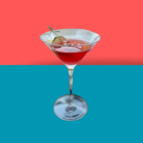 Red By My Side cocktail in a martini glass