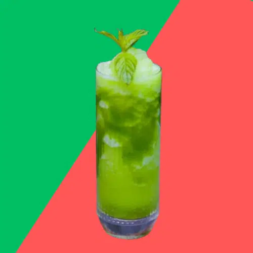 Bright green Neon Iguana in a tall glass with crushed ice and mint