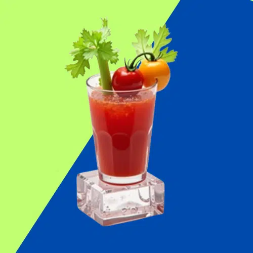 Red Devil Reviver in a tumbler garnished with celery and cherry tomatoes