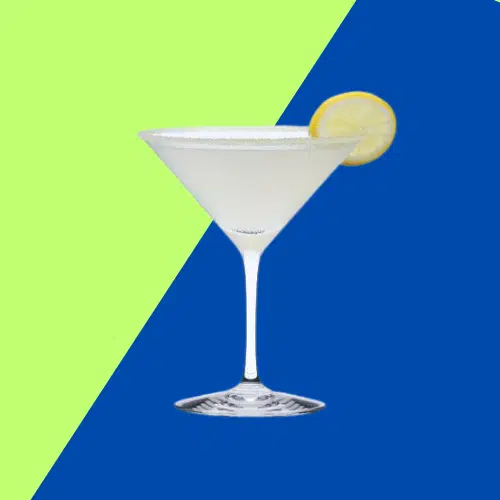 Pale Spider-Man cocktail in a martini glass with a lemon wheel