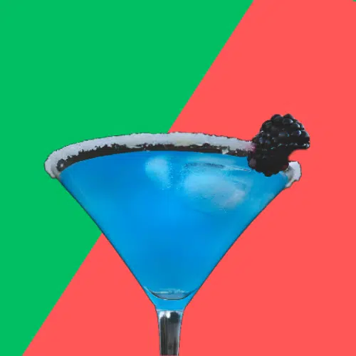 Bright blue Blueberry Martini with a sugared rim and a berry garnish